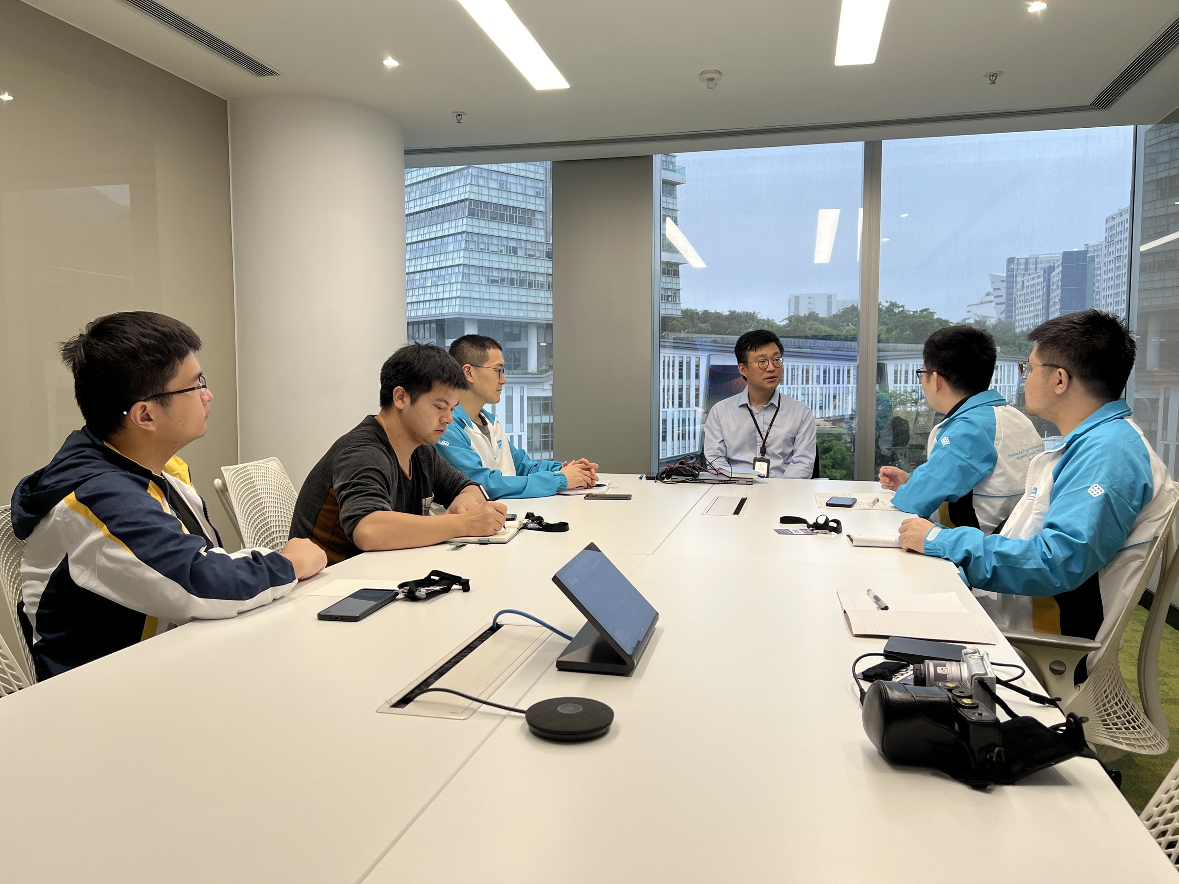 A meeting between TRS project members and ARUP Dr. Xiao-Ye Yu